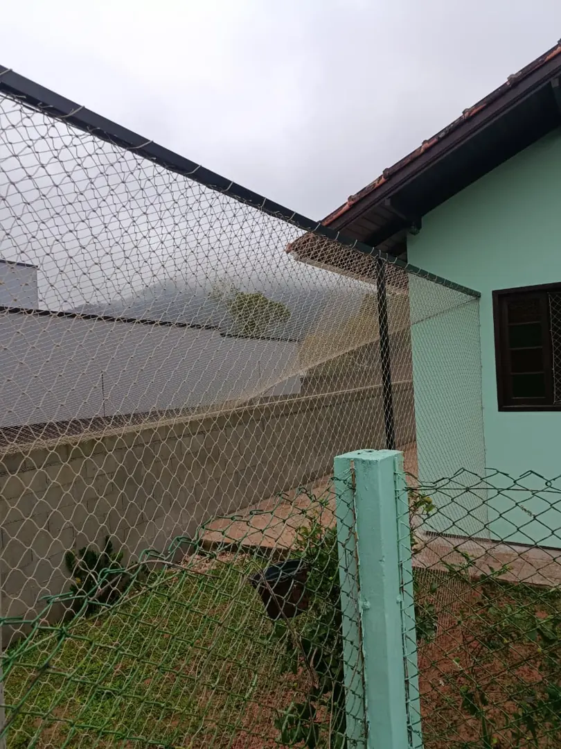 Fechamento com rede em área externa de residência